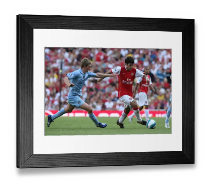 Framed Print : Cesc Fabregas (Arsenal) Michael Johnson (Man City) Framed Print : Cesc Fabregas (Arsenal) Michael Johnson (Man City)