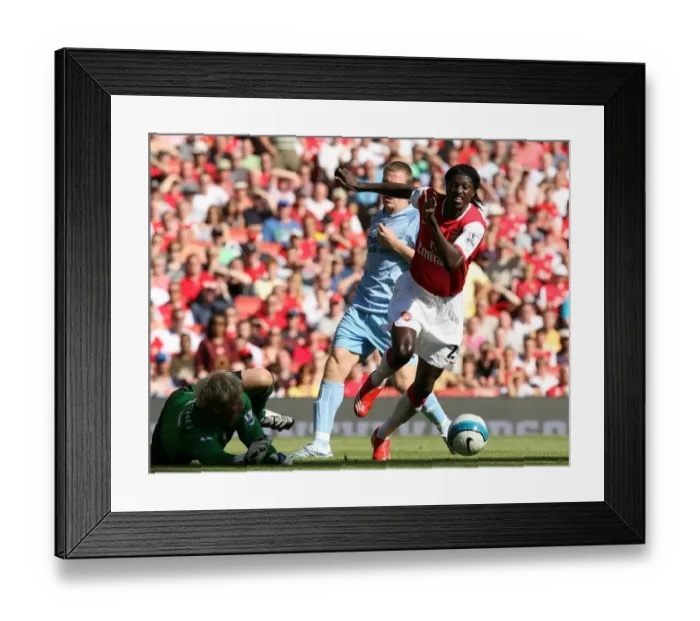 Framed Print : Emmanuel Adebayor (Arsenal) Casper Schmeichel (Man City) Framed Print : Emmanuel Adebayor (Arsenal) Casper Schmeichel (Man City)