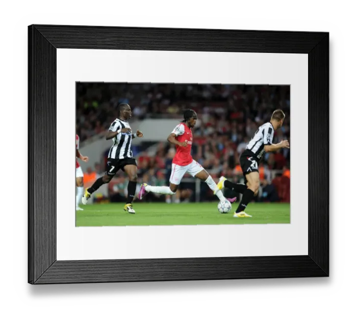 Framed Print : Gervinho (Arsenal) Emmanuel Agyemang-Badu and Joel Ekstrand (Udinese). Arsenal 1: 0 Udinese Framed Print : Gervinho (Arsenal) Emmanuel Agyemang-Badu and Joel Ekstrand (Udinese). Arsenal 1: 0 Udinese