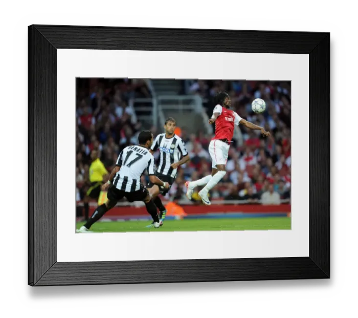 Framed Print : Gervinho's Goal: Arsenal Leads Udinese 1-0 in UEFA Champions League Qualifier
