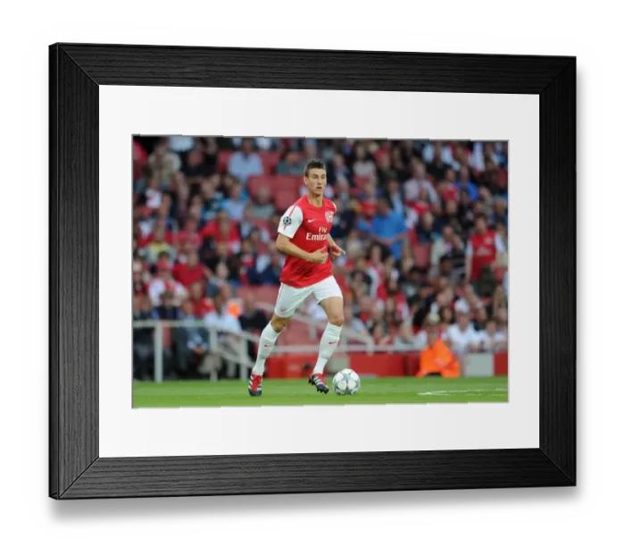 Framed Print : Laurent Koscielny (Arsenal). Arsenal 1: 0 Udinese. UEFA Champins League Qualifying Round, 1st leg Framed Print : Laurent Koscielny (Arsenal). Arsenal 1: 0 Udinese. UEFA Champins League Qualifying Round, 1st leg