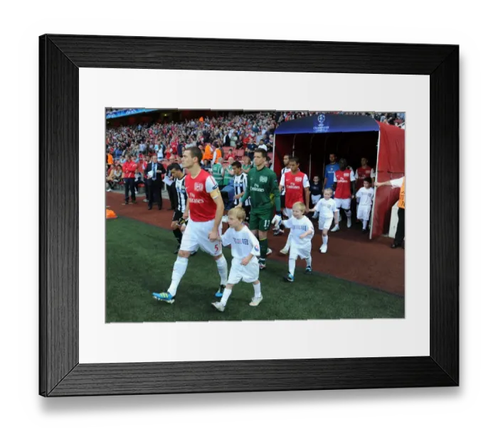 Framed Print : Arsenal vs Udinese: Thomas Vermaelen Leads Out The Gunners In UEFA Champions League Play-Off, 2011 Framed Print : Arsenal vs Udinese: Thomas Vermaelen Leads Out The Gunners In UEFA Champions League Play-Off, 2011