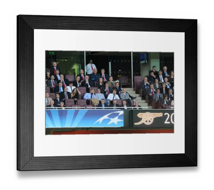 Framed Print : Arsene Wenger the Arsenal Manager watches the match from the Directors Box with his assistant Boro Primorac. Arsenal 1: 0 Udinese. UEFA Champins League Qualifying Round, 1st leg. Emirates Stadium, 16  /  8  /  11. Credit : Arsenal Football Club  / 