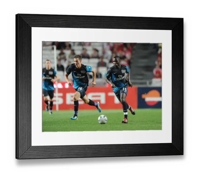 Framed Print : Frimpong and Ramsey: Arsenal's Midfield Duo Shine in Pre-Season Friendly Against Benfica (2011) Framed Print : Frimpong and Ramsey: Arsenal's Midfield Duo Shine in Pre-Season Friendly Against Benfica (2011)