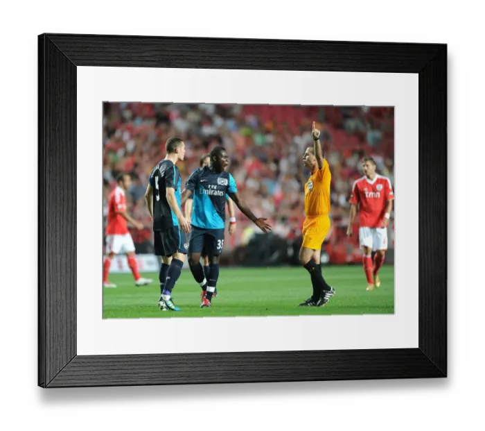 Framed Print : Arsenal's Vermaelen and Frimpong Clash with Referee Gomes in Benfica Friendly Framed Print : Arsenal's Vermaelen and Frimpong Clash with Referee Gomes in Benfica Friendly