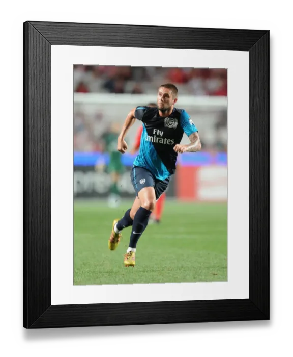 Framed Print : Henri Lansbury: Battle at Estadio da Luz - Benfica vs. Arsenal Pre-Season Clash (2011) Framed Print : Henri Lansbury: Battle at Estadio da Luz - Benfica vs. Arsenal Pre-Season Clash (2011)