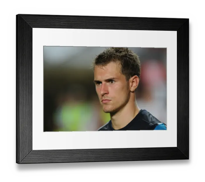 Framed Print : Aaron Ramsey in Action: Benfica vs. Arsenal Pre-Season Friendly, 2011 Framed Print : Aaron Ramsey in Action: Benfica vs. Arsenal Pre-Season Friendly, 2011