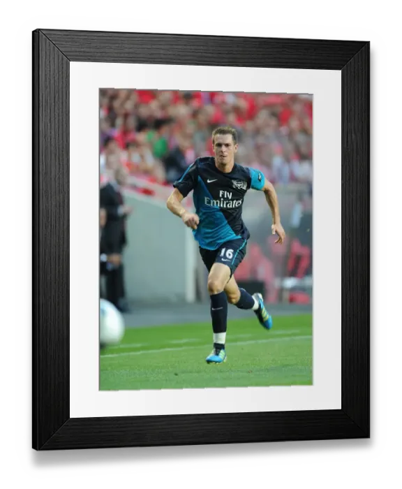 Framed Print : Aaron Ramsey in Action: Benfica vs Arsenal Pre-Season Friendly, 2011 Framed Print : Aaron Ramsey in Action: Benfica vs Arsenal Pre-Season Friendly, 2011