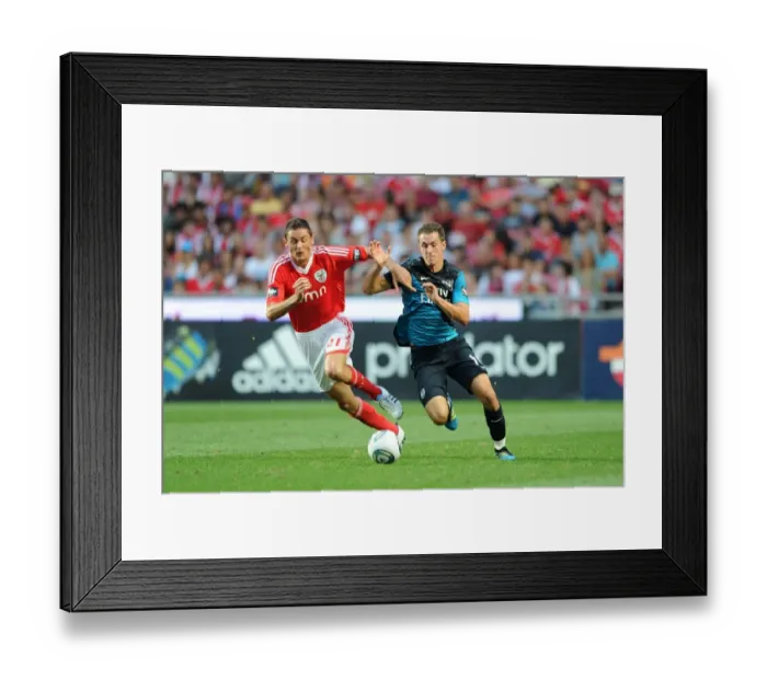 Framed Print : Ramsey vs. Matic: Clash in the Pre-Season Friendly between Benfica and Arsenal (2011)