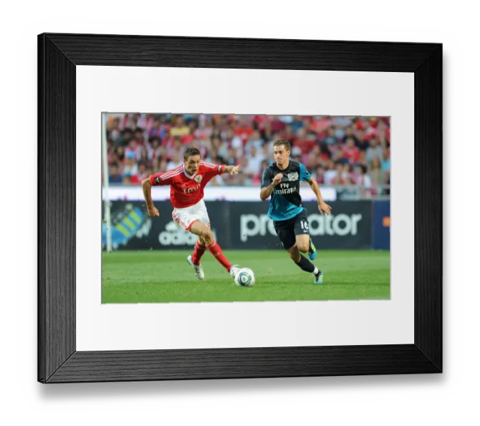 Framed Print : Ramsey vs. Matic: Clash in the 2011 Pre-Season Friendly between Arsenal and Benfica Framed Print : Ramsey vs. Matic: Clash in the 2011 Pre-Season Friendly between Arsenal and Benfica