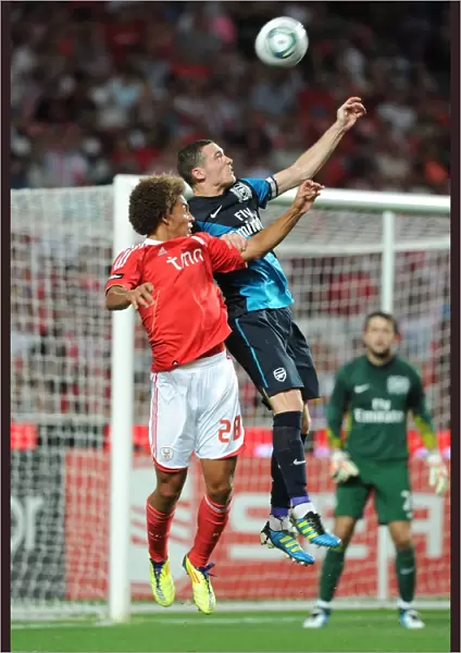 Thomas Vermaelen Soaring High: Benfica vs. Arsenal, 2011 Pre-Season Clash at Estadio da Luz