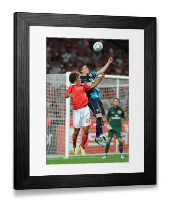 Framed Print : Thomas Vermaelen Soaring High: Benfica vs. Arsenal, 2011 Pre-Season Clash at Estadio da Luz Framed Print : Thomas Vermaelen Soaring High: Benfica vs. Arsenal, 2011 Pre-Season Clash at Estadio da Luz