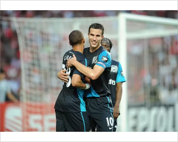 Van Persie and Gibbs: Arsenal's Unstoppable Duo Celebrate Goal in Benfica Pre-Season Clash, 2011
