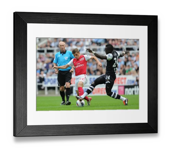 Framed Print : Arshavin vs. Tiote: Battle in the Premier League - Newcastle United vs. Arsenal (2011) Framed Print : Arshavin vs. Tiote: Battle in the Premier League - Newcastle United vs. Arsenal (2011)