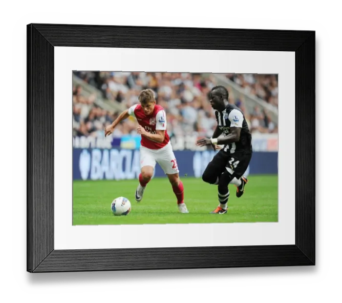 Framed Print : Andrey Arshavin Outmaneuvers Chiek Tiote in Newcastle United vs Arsenal Premier League Clash Framed Print : Andrey Arshavin Outmaneuvers Chiek Tiote in Newcastle United vs Arsenal Premier League Clash