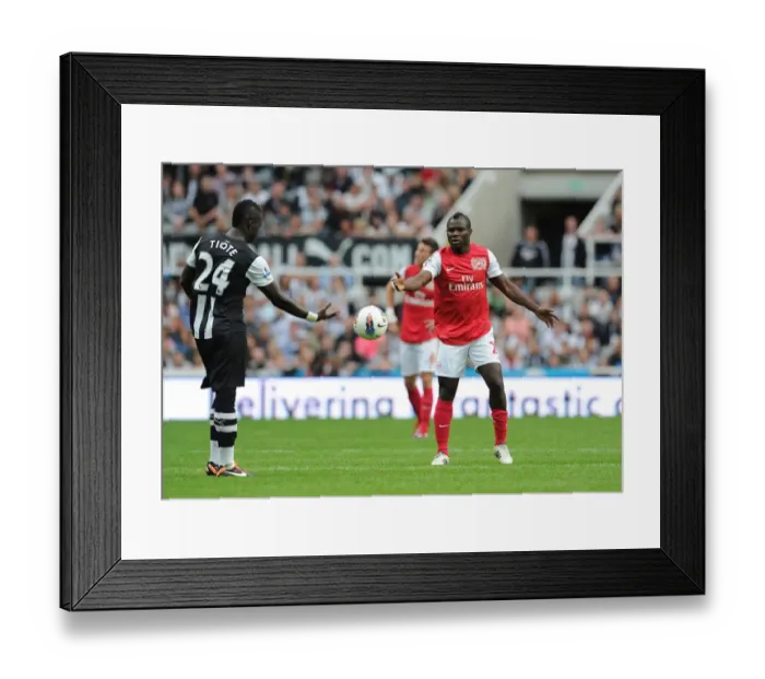Framed Print : Clash of Midfielders: Tiote vs. Frimpong - Newcastle United vs. Arsenal, 2011-12 Premier League Framed Print : Clash of Midfielders: Tiote vs. Frimpong - Newcastle United vs. Arsenal, 2011-12 Premier League
