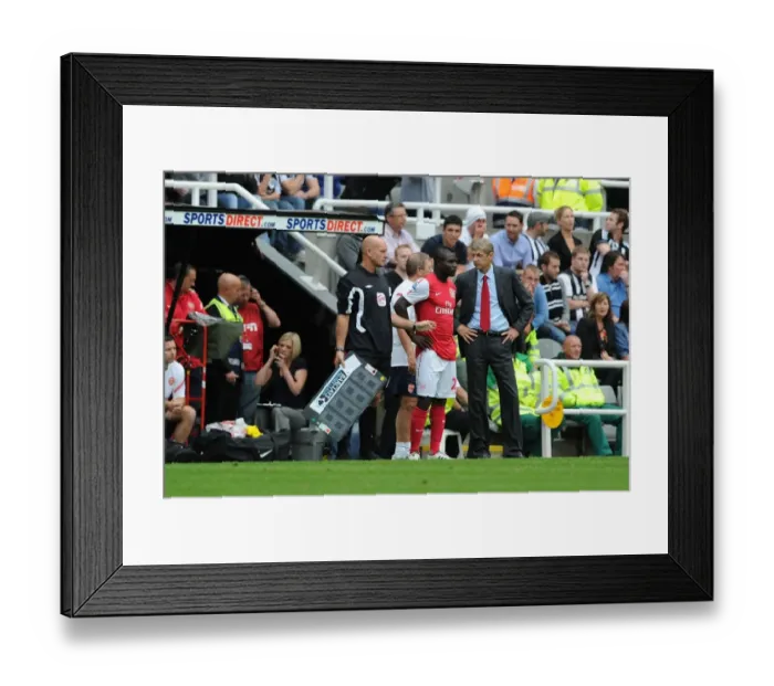 Framed Print : Arsene Wenger Welcomes Emmanuel Frimpong to Arsenal Debut Stage: Newcastle United vs Arsenal (2011-12) Framed Print : Arsene Wenger Welcomes Emmanuel Frimpong to Arsenal Debut Stage: Newcastle United vs Arsenal (2011-12)