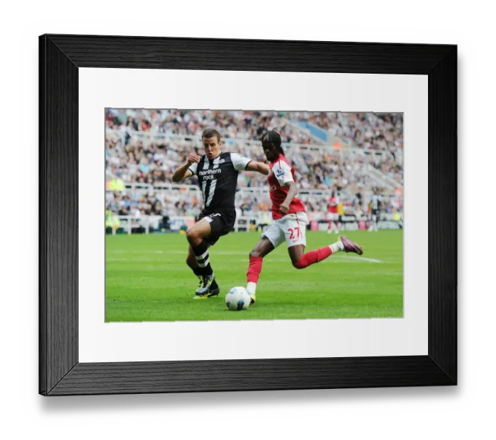 Framed Print : Gervinho vs. Ryan Taylor: Battle at St. James Park - Arsenal vs. Newcastle United, Premier League 2011-12 Framed Print : Gervinho vs. Ryan Taylor: Battle at St. James Park - Arsenal vs. Newcastle United, Premier League 2011-12
