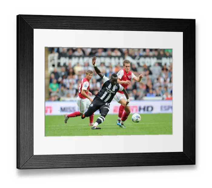 Framed Print : Clash of Titans: Tiote vs. Ramsey - Newcastle United vs. Arsenal, Premier League 2011 Framed Print : Clash of Titans: Tiote vs. Ramsey - Newcastle United vs. Arsenal, Premier League 2011