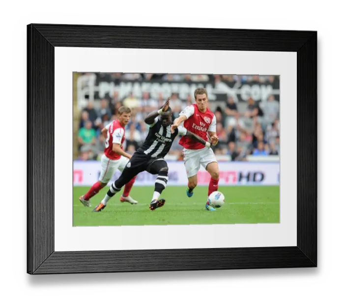 Framed Print : Ramsey vs. Tiote: Intense Battle in Newcastle United vs. Arsenal (2011-12)