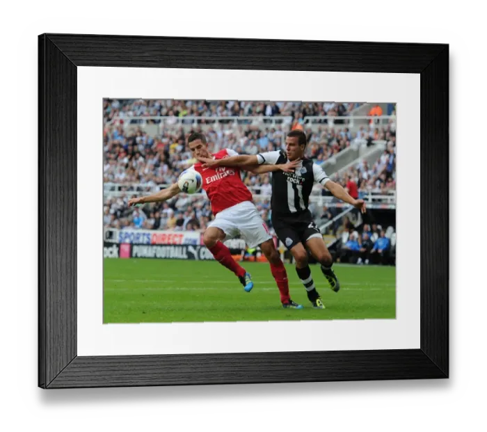 Framed Print : Clash at St. James Park: Robin van Persie vs. Ryan Taylor