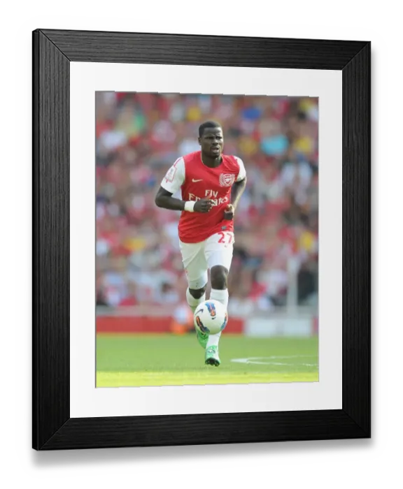 Framed Print : Arsenal's Emmanuel Eboue in Action against New York Red Bulls during the Emirates Cup 2011-12 Framed Print : Arsenal's Emmanuel Eboue in Action against New York Red Bulls during the Emirates Cup 2011-12