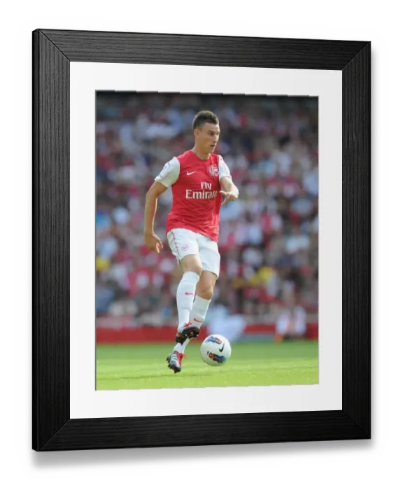 Framed Print : Arsenal's Laurent Koscielny in Action against New York Red Bulls at Emirates Cup 2011 Framed Print : Arsenal's Laurent Koscielny in Action against New York Red Bulls at Emirates Cup 2011