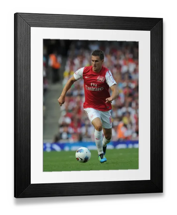 Framed Print : Aaron Ramsey (Arsenal). Arsenal 1: 1 New York Red Bulls. Emirates Cup Day 2