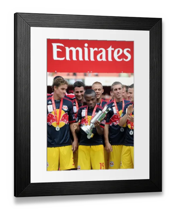 Framed Print : Arsenal's Emirates Cup Showdown with New York Red Bulls: Dale Richards Hoists the Trophy after 1-1 Draw - Emirates Stadium, July 31, 2011 Framed Print : Arsenal's Emirates Cup Showdown with New York Red Bulls: Dale Richards Hoists the Trophy after 1-1 Draw - Emirates Stadium, July 31, 2011