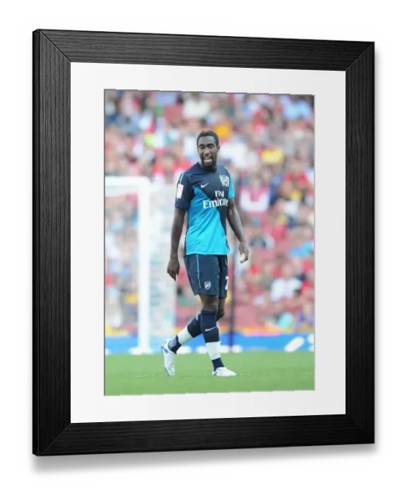 Framed Print : Arsenal's Johan Djourou Faces Off Against Boca Juniors in the Emirates Cup Framed Print : Arsenal's Johan Djourou Faces Off Against Boca Juniors in the Emirates Cup