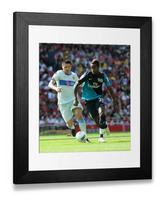 Framed Print : Johan Djourou (Arsenal) Juan Riquelme (Boca). Arsenal 2: 2 Boca Juniors