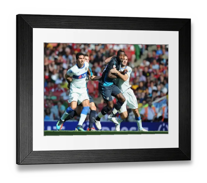 Framed Print : Arsenal vs. Boca Juniors: Johan Djourou Clashes with Rolando Schiavi and Iuan Insaurralde Framed Print : Arsenal vs. Boca Juniors: Johan Djourou Clashes with Rolando Schiavi and Iuan Insaurralde