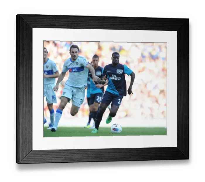 Framed Print : Intense Face-Off: Emmanuel Eboue vs. Rolando Schiavi at the 2011 Emirates Cup (Arsenal vs. Boca Juniors) Framed Print : Intense Face-Off: Emmanuel Eboue vs. Rolando Schiavi at the 2011 Emirates Cup (Arsenal vs. Boca Juniors)