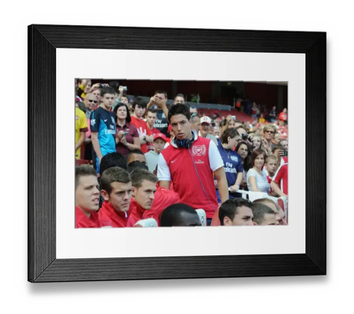 Framed Print : Samir Nasri Watching NY Red Bulls vs Paris St. Germain at Emirates Cup, 2011
