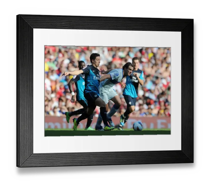 Framed Print : Clash of Stars: Samir Nasri vs. Rolando Schiavi - Arsenal v Boca Juniors, Emirates Cup 2011