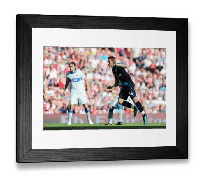Framed Print : Arsenal's Aaron Ramsey Scores Second Goal Against Boca Juniors in 2011 Emirates Cup