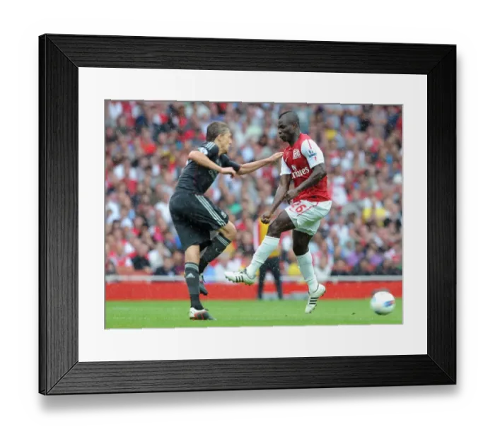 Framed Print : Emmanuel Frimpong (Arsenal) fouls Lucas (Liverpool). Arsenal 0: 2 Liverpool
