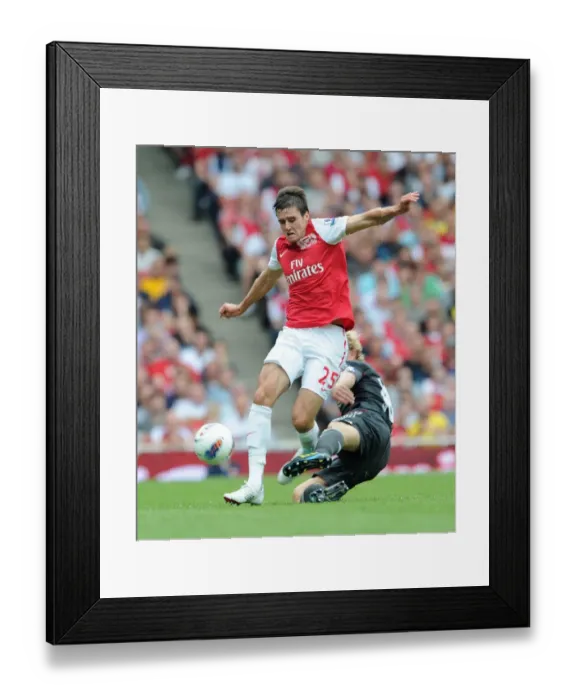 Framed Print : Dirk Kuyt Outshines Carl Jenkinson: Liverpool's Victory Over Arsenal in the Barclays Premier League (2011-2012) Framed Print : Dirk Kuyt Outshines Carl Jenkinson: Liverpool's Victory Over Arsenal in the Barclays Premier League (2011-2012)