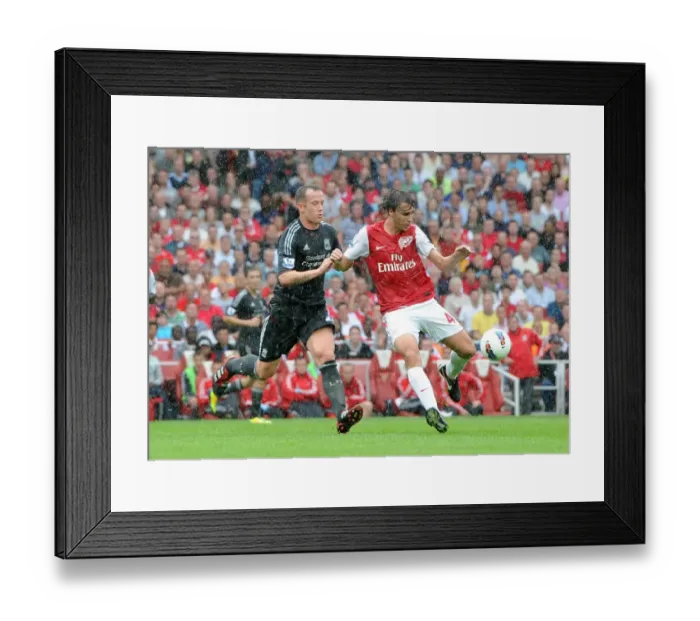 Framed Print : Ignasi Miquel (Arsenal) Charlie Adam (Liverpool). Arsenal 0: 2 Liverpool Framed Print : Ignasi Miquel (Arsenal) Charlie Adam (Liverpool). Arsenal 0: 2 Liverpool