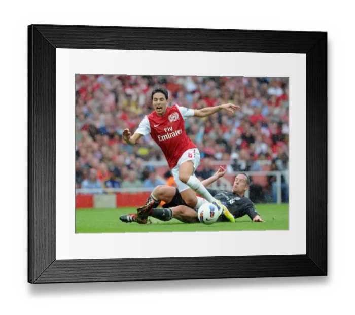 Framed Print : Samir Nasri (Arsenal) Charlie Adam (Liverpool). Arsenal 0: 2 Liverpool. Barclays Premier League Framed Print : Samir Nasri (Arsenal) Charlie Adam (Liverpool). Arsenal 0: 2 Liverpool. Barclays Premier League