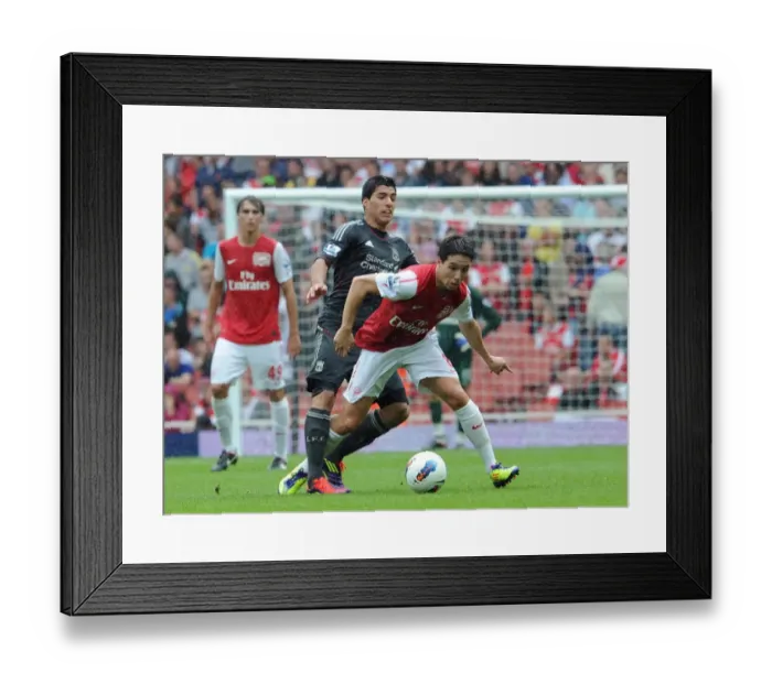 Framed Print : Samir Nasri (Arsenal) Luis Suarez (Liverpool). Arsenal 0: 2 Liverpool. Barclays Premier League