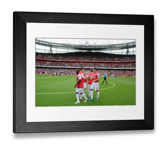Framed Print : Arsenal vs Liverpool: Bacary Sagna's Determined Stance at Emirates Stadium (2011-2012)