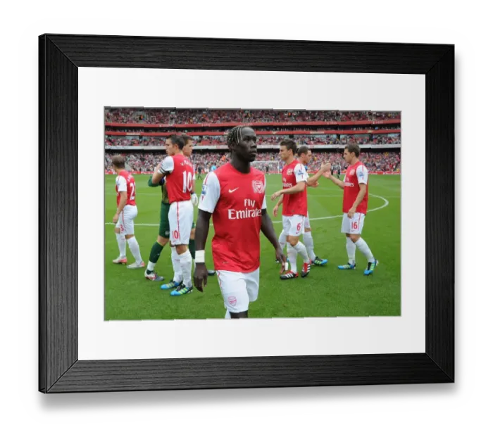 Framed Print : Bacary Sagna's Steely Gaze: Arsenal's Defender Before the Battle Against Liverpool (2011-2012)