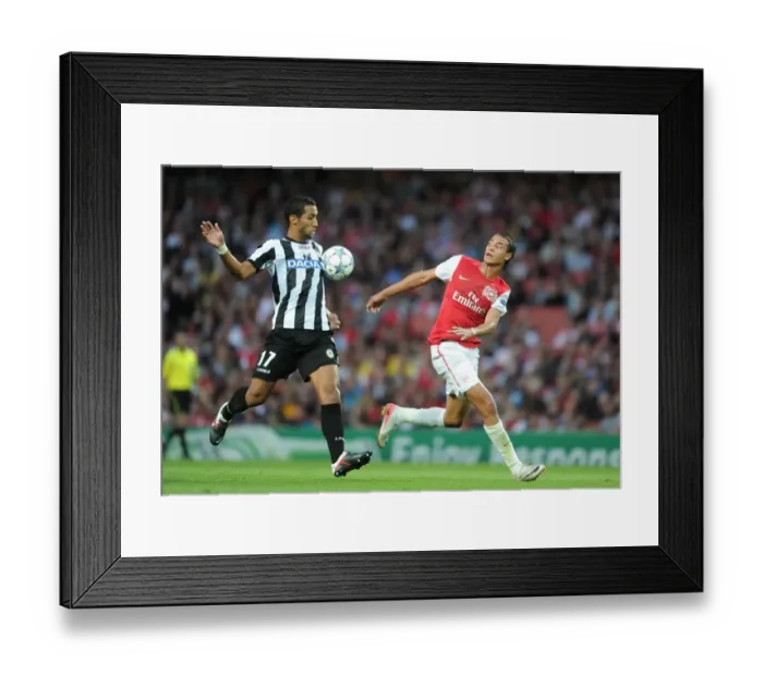 Framed Print : Chamakh vs Benatia: A Clash of Strengths in Arsenal's UEFA Champions League Showdown with Udinese Framed Print : Chamakh vs Benatia: A Clash of Strengths in Arsenal's UEFA Champions League Showdown with Udinese