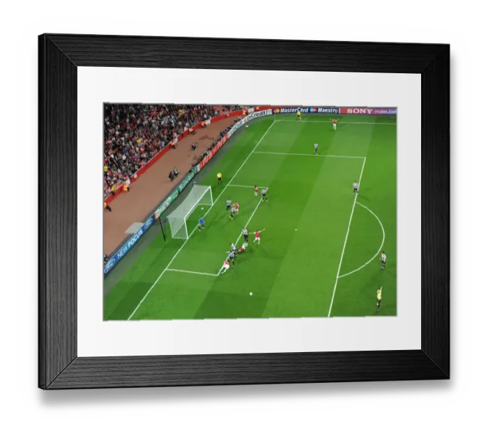 Framed Print : Arsenal's Emirates Stadium: A Battle in the UEFA Champions League Play-Offs against Udinese (2011)