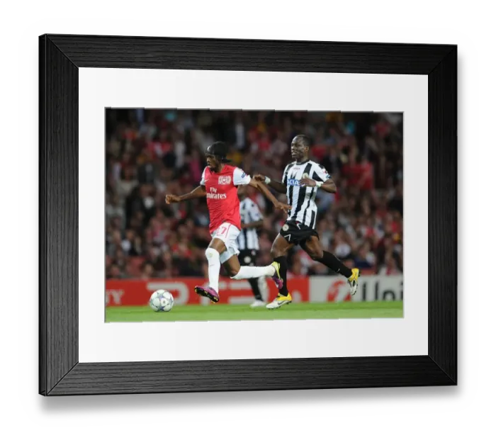 Framed Print : Gervinho vs. Agyemang-Badu: A Battle of Wits at the Emirates - Arsenal vs. Udinese, UEFA Champions League Play-Off, 2011 Framed Print : Gervinho vs. Agyemang-Badu: A Battle of Wits at the Emirates - Arsenal vs. Udinese, UEFA Champions League Play-Off, 2011