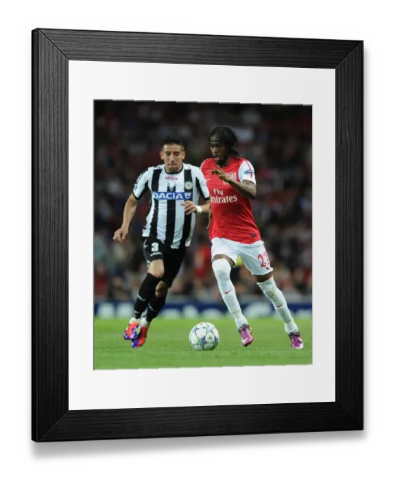 Framed Print : Gervinho's Electric Debut: Arsenal's Thrilling UEFA Champions League Victory Over Udinese (2011-12) Framed Print : Gervinho's Electric Debut: Arsenal's Thrilling UEFA Champions League Victory Over Udinese (2011-12)