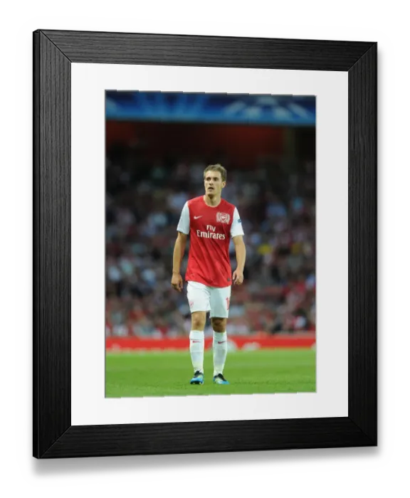 Framed Print : Arsenal's Aaron Ramsey in Action: Arsenal vs. Udinese, 2011-12 UEFA Champions League Play-Off