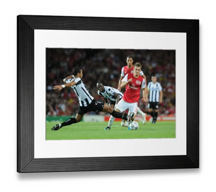 Framed Print : Ramsey vs. Benatia: A Champion's Battle in Arsenal's 2011 Champions League Showdown Framed Print : Ramsey vs. Benatia: A Champion's Battle in Arsenal's 2011 Champions League Showdown