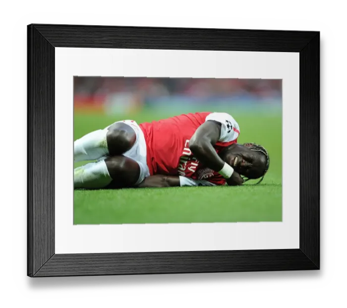 Framed Print : Bacary Sagna's Injury: Arsenal v Udinese, UEFA Champions League Play-Off 2011 Framed Print : Bacary Sagna's Injury: Arsenal v Udinese, UEFA Champions League Play-Off 2011